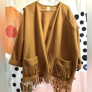 Fleece sweater with fringe details. Camel/tan color. Size S/M.